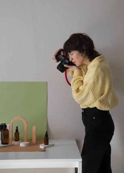 side-view-woman-working-photography-studio (1)